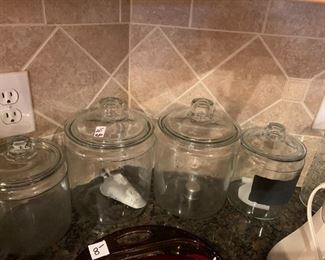 #155	Kitchen	Glass Canisters - set of 8	 $ 20.00 