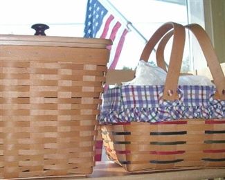 18 Longaberger baskets - all new.  Some in boxes. Pre2000