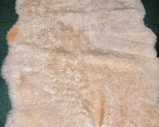 Large sheepskin (made from 4 smaller ones).  Will need to be washed.  Good condition