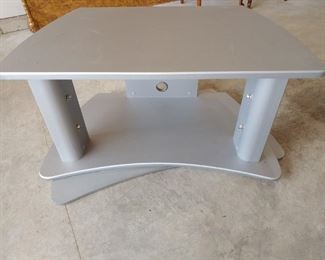 grey swivel  TV stand 43 x 21w x  22h  Please see next photo    $15
NOW FREE