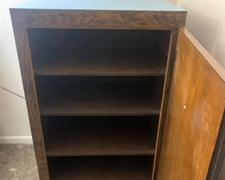 Wood Cabinet with blue top and 4 enclosed shelves	32x22x15	HxWxD
