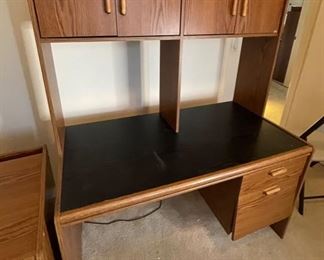 AS-IS Faux Wood Veneer Desk with shelf	62x49x27in	HxWxD
