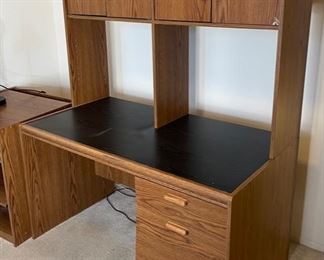 AS-IS Faux Wood Veneer Desk with shelf	62x49x27in	HxWxD
