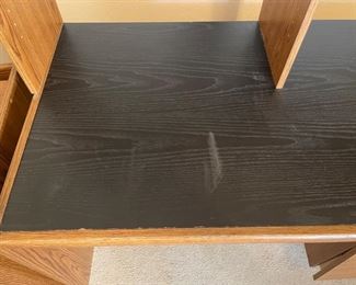 AS-IS Faux Wood Veneer Desk with shelf	62x49x27in	HxWxD
