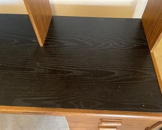 AS-IS Faux Wood Veneer Desk with shelf	62x49x27in	HxWxD
