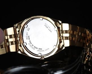 Mens Seiko Quartz Day/Date 7N43-8111 Watch Gold Tone Band	37mm wide with crown	
