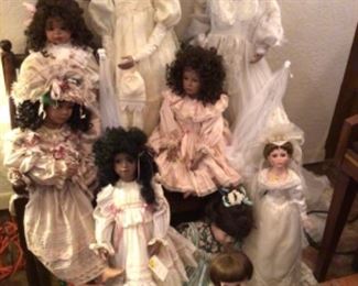 Variety of handmade porcelain dolls In Wedding attire
