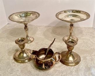40- $50 - Sterling weighted 2 compotes & 2 sticks (creamer sp)	$50 