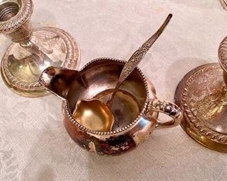 40- $50 - Sterling weighted 2 compotes & 2 sticks (creamer sp)	$50 