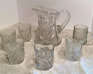 45- $60 Cut crystal pitcher with 5 cut crystal glass + bonus glass 	
