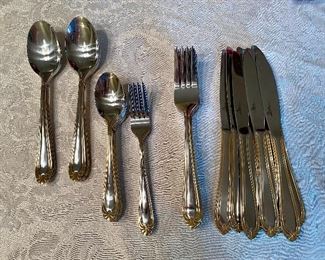 #63 - $70  Gibson china & flatware - service for 8 and more