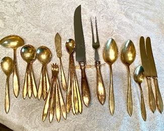 62- $40 - Dulyte gold dipped flatware 2 knifes, 5 bouillons spoons, 4 ice tea, 6 serving pieces + Swedish meat carving set 				
