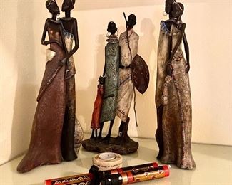70-$50	Lot of three African people x 3,  15” includes candles 	