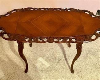 #74 - $90 - Walnut carved side table with drop sides c.1960’s – open 38”x 16”D x 24”	