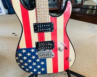 American Flag Electric Guitar (was signed by Bill Clinton but the signature was dusted off over the years. Bummer). There's a COA. But who cares since you can't see it anyway. 
