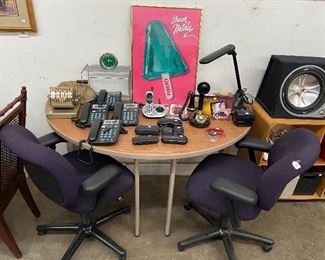 Unique half circle desk, we have 4 of these purple office chairs, telephones, lamps, etc.