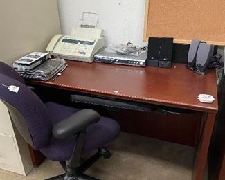 We have two of these sleek desks. With pull out keyboard tray.