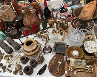 Incredible selection of brass, pottery, baskets, carved wood items.