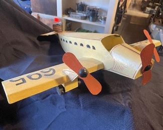 An antique tin model plane also from Presley estate.