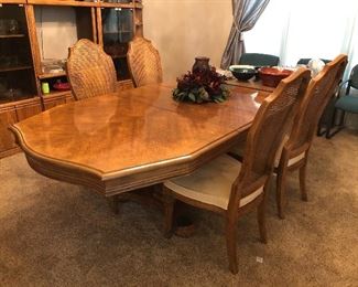 Dining room table with 2 leafs (as shown), 4 side chairs and 2 captains chairs - also includes table pads