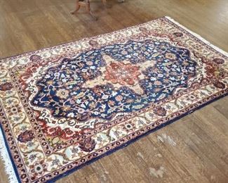 One of several Oriental scatter rugs