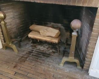 Several andirons and fireplace tools