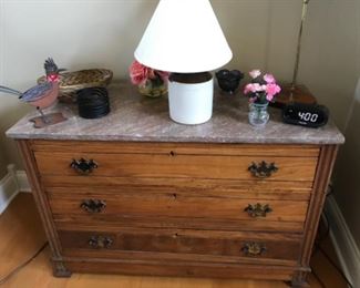 Marble top dresser , stone jug electrified to make a lamp. Folk Art Road Runner. 