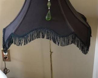 Wood base lamp with fun and funky black lampshade 