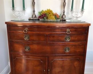 Server that matches both table and the buffet. Lead crystal candlesticks and pewter candlesticks. 