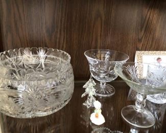 Large selection of lead crystal, pressed, and cut glass pieces. 