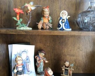 Hummel's and porcelain hummingbird 