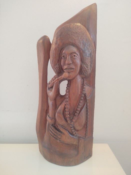 Hand carved wooden sculpture of  lady singer with amazing afro signed Emil