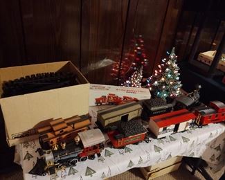 Two different Christmas train sets, collectible Sears semi with corvette, ceramic Christmas trees