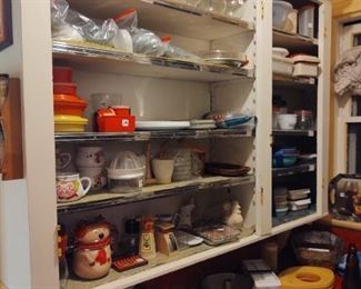 Lots of vintage Tupperware serving pieces, storage pieces
