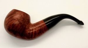 Peterson “Kildare” Tobacco Pipe. Beautiful curved piece made in Ireland. Measures close to 6” long and the bowl is a little over 1.5” high.
