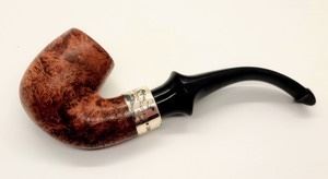 Peterson “Deluxe” Tobacco Pipe Accented with Sterling Silver. Beautiful briar wood pipe from Ireland. Measures 6” long and the bowl is 1 3/4” high.
