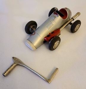 Vintage Schuco Micro Racer. Some light wear as pictured. Includes the wind-up key. Measures 4” long.
