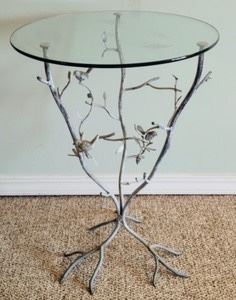 Pretty Glass Topped Metal Bird Table. Beautiful accent table measures 20” in diameter and 29” high.