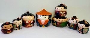 Vintage Japanese Stacking Dolls. Cute little dolls open to store your treasures! The largest measures 5” high and 6” in diameter. The smallest is 3” high and 3” in diameter.