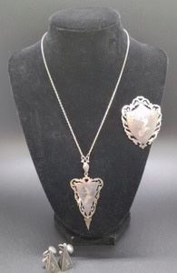 Vintage Sterling Silver Jewelry Set. Marked sterling from Siam. The necklace chain measures about 21”.