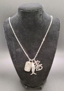 Asian Inspired Sterling Silver Necklace. Each charm measures about an inch. Chain is 21”.