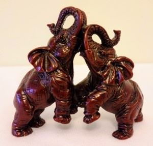 Carved Elephants. Measures 4” wide and 3.5” high.