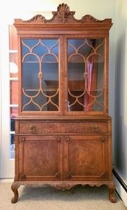 Glass Front Display Hutch. A very nice piece in excellent condition. Measures 38" wide, 16" deep and 75" high.