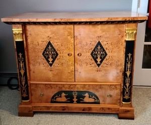 Biedermeier Entertainment Cabinet. The bottom shelf needs an easy repair and there is some light fading on the top as pictured. Measures 47” wide, 21.5” deep and 38” high.