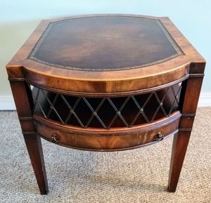 Vintage Side Table with a very fun design and inlaid top.  Some light scratches on the top, but in otherwise great condition. Measures 20.5” x 25.5” and 21” high.