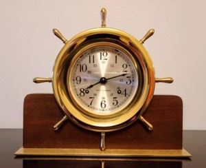 Seth Thomas Brass Helmsman 8 Day Ship Clock. The key is missing, so unable to test if in working order. Measures 10.5” wide and 9” high.