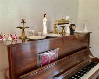 Piano, figurines, antique brass eagle candle holders