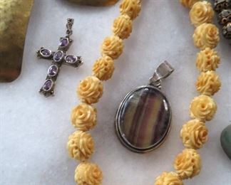 Carved bone rosette beaded necklace and sterling silver pendants