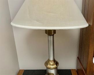 $75 - AAMKETHAN 1807( Fayetteville, NC) two tone metal table lamp with oval shade (shade has some discoloration). 33.5"H x 22"W. x14"D
