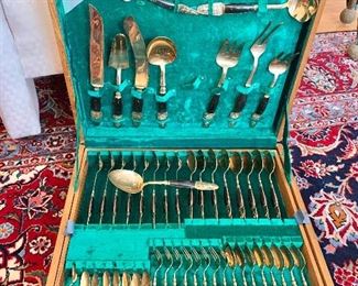 $140 - S.Samran Thailand flatware.  Eight piece place settings with serving pieces.  